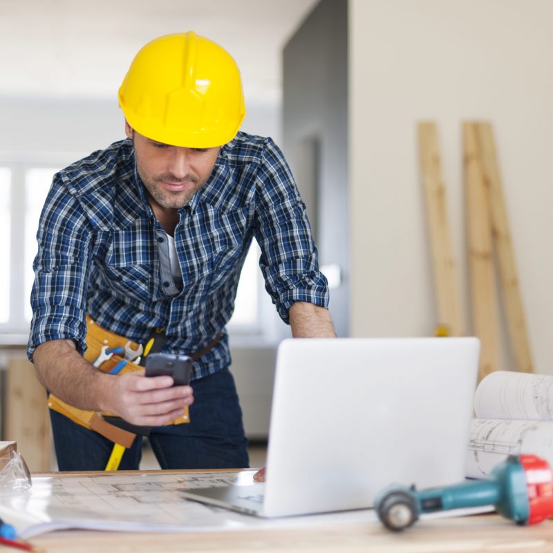 Busy building contractor at work